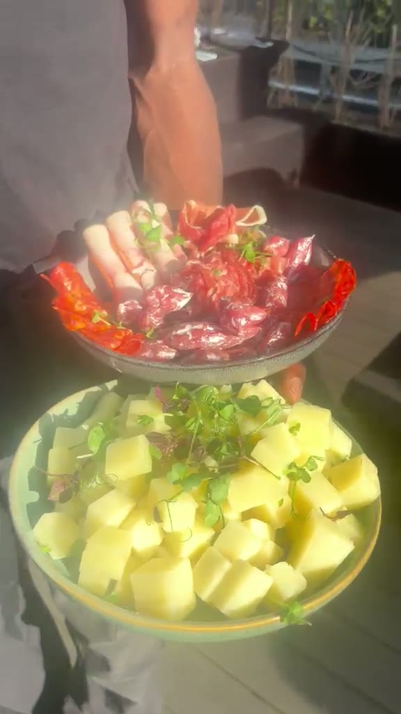 Served starters on sharing plates at a barbecue party